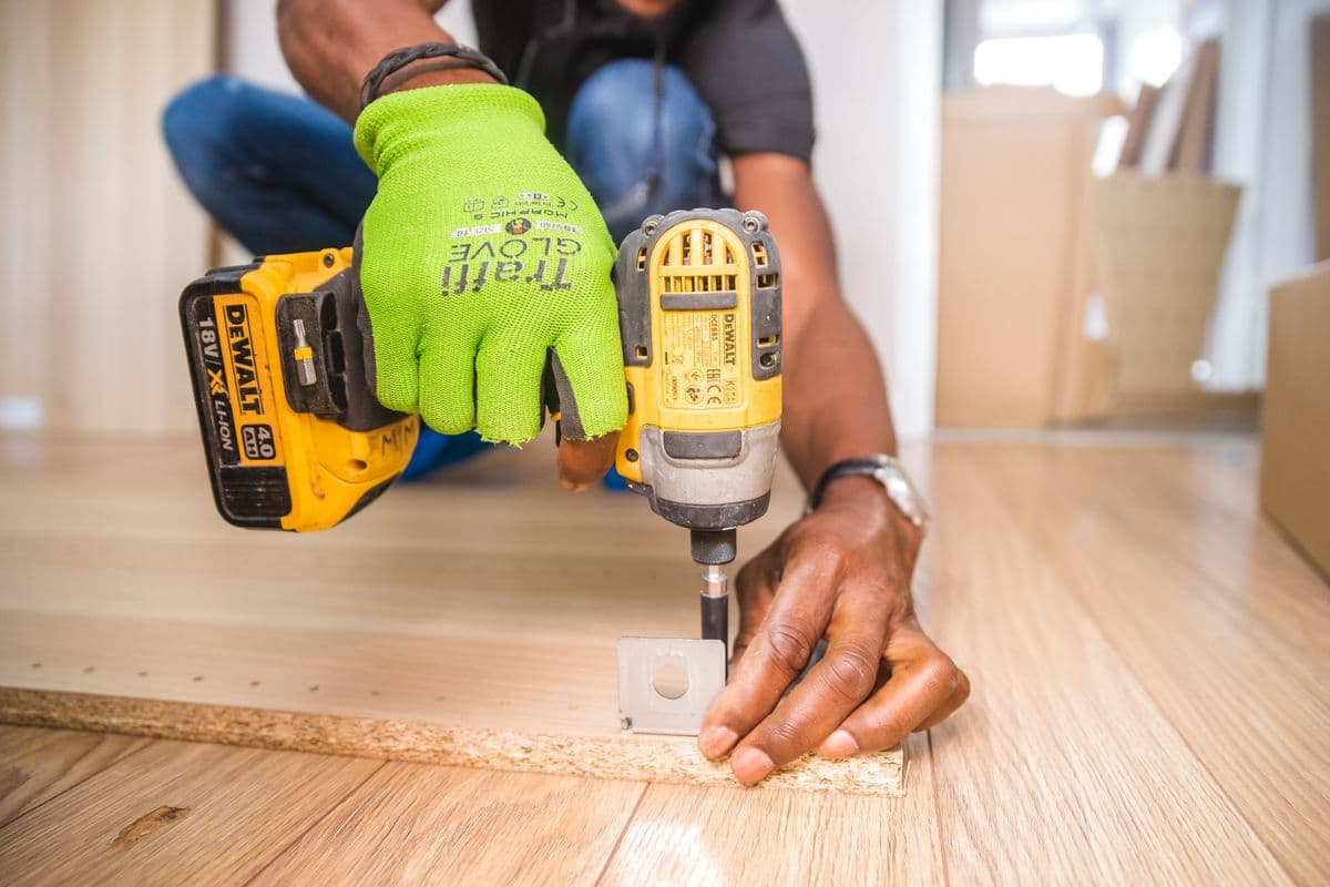 Odd-job assembly with a drill on the floor